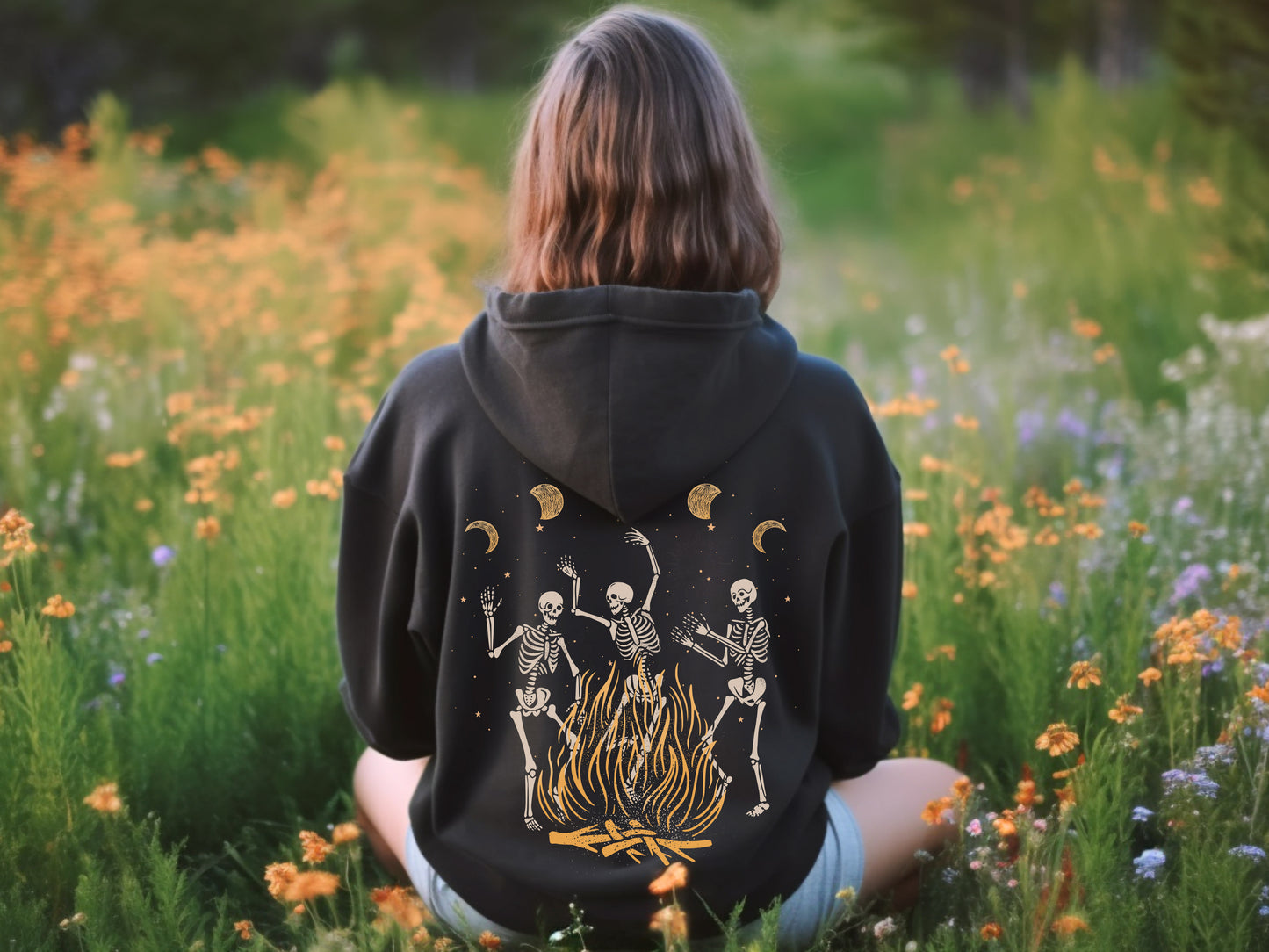 Dancing Skeleton and Bonfire Hoodie in forest