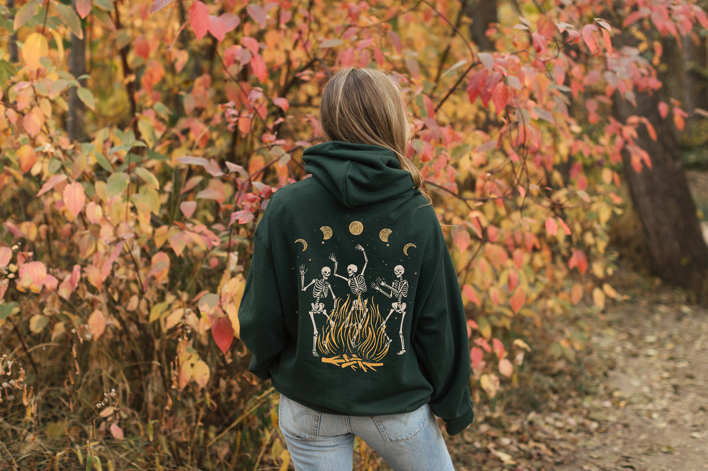 Dancing Skeleton and Bonfire Hoodie in forest green